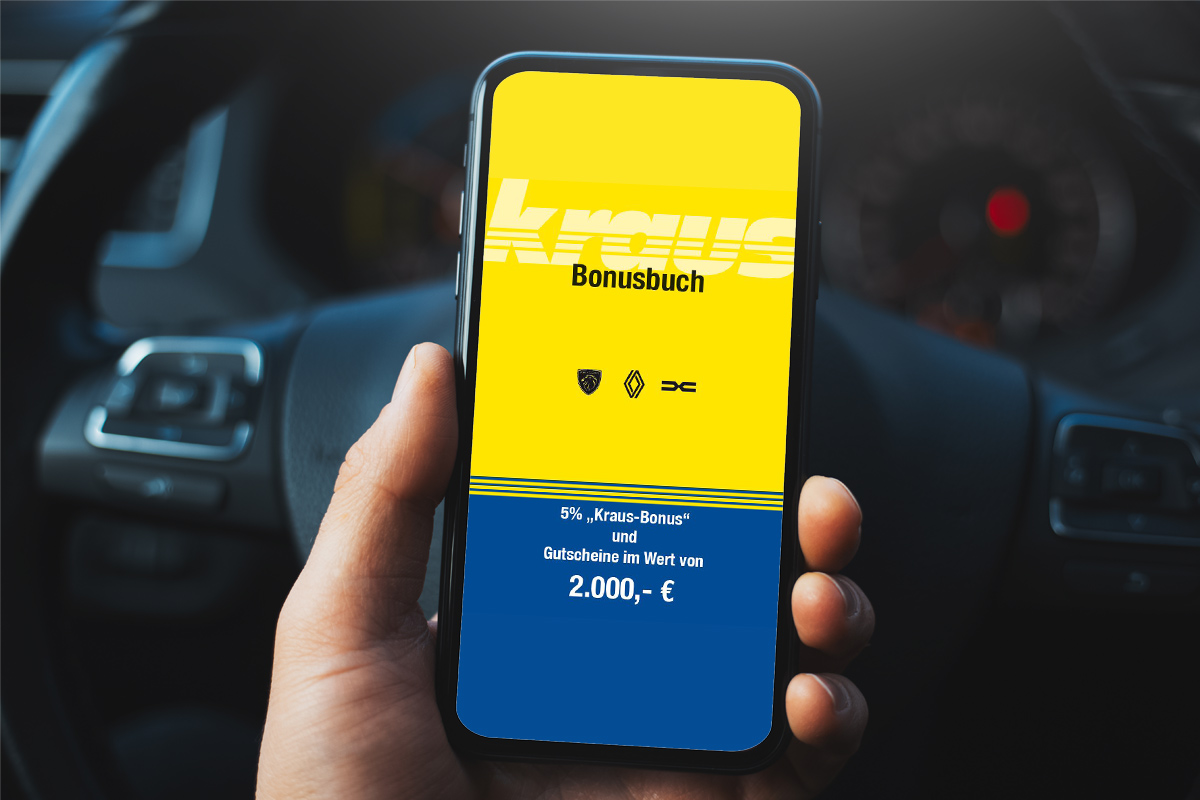 handy bildchirm und im hintergrund ein Lenkrad
